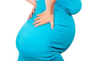 rygsmerter i begyndelsen af ​​graviditeten
